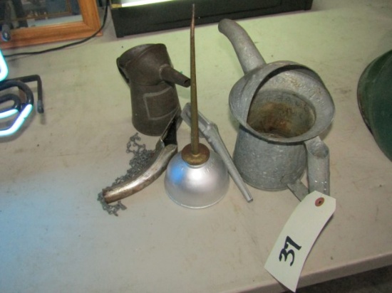 LOT OF OIL CANS FUNNELS