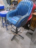 FOUR BAR STOOLS WITH BIG A AUTO PARTS AND BLUE BUCKET SEAT