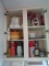 CABINET LOT WITH CORNING WARE VASES TO GO CUPS BLACK AND DECKER CAN OPENER