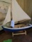 OVAL END TABLE WITH MODEL OF SAIL BOAT