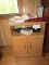 OAK FINISHED SMALL ENTERTAINMENT CENTER WITH DECORATIVE ITEMS