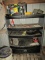 LARGE BARN CONTENT LOT TO INCLUDE METAL SHELVING ROLLERS FEED BAGS SAWS AND