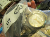 BAG OF MENS WRISTWATCHES AND POCKET KNIVES AND MONEY CLIPS