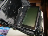 PORTABLE SONY DVD PLAYER WITH CARRYING CASE AND HEAD PHONES