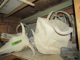 SHELF LOT INCLUDING CANVAS TOOL BAGS STEER HEADS AND MORE
