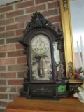 EMPIRE STYLE MANTEL CLOCK WITH CHERUBS APPROXIMATELY 24 INCH TALL