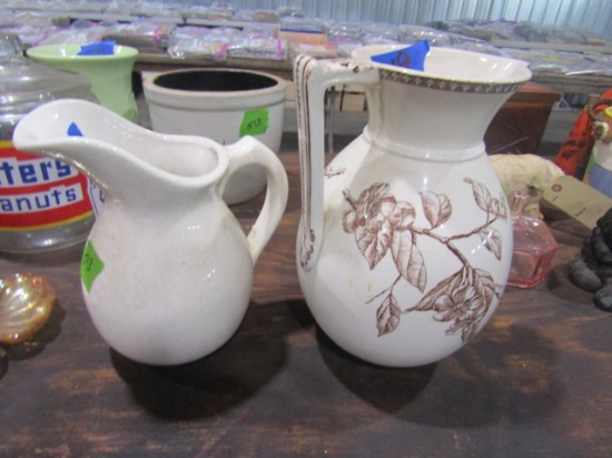 PAIR OF IRONSTONE PITCHERS ONE WITH FLORAL DESIGN AND BUTTERFLIES