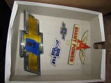 TWO PORCELAIN AND METAL CHEVROLET EMBLEMS AND TAG TOPPER GIANT POWER AND LA