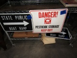 DANGER PESTICIDE STORAGE SIGN AND OTHER SIGNS