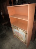 2 TIER BOOK SHELF WITH 2 DOORS WITH HAND PAINTED PIG SCENE