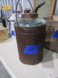 ANTIQUE METAL OVER HAND BLOWN GLASS FUEL CAN BY MASCOT APPROX 1 GALLON