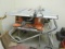 RIGID TABLE SAW ON WORK N HAUL IT STAND 2 WHEEL