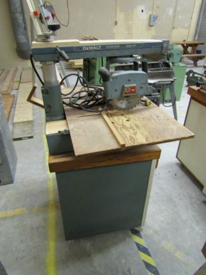 DEWALT AND BLACK AND DECKER RADIAL ARM SAW 9" BLADE ON CABINET WITH CASTERS
