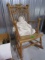 ANTIQUE CHILDS ROCKER WITH ANTIQUE BABY DOLL PORCELAIN FACE HAND PAINTED