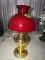 ANTIQUE BRASS OIL LAMP WITH MAROON SHADE