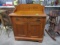 ANTIQUE OAK WASH STAND WITH CARVED BACK SPLASH AND FRONT ONE DRAWER TWO DRA