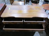 ANTIQUE OAK SIDE BOARD WITH THREE DRAWERS AND TWO DOORS CARVED DESIGNS ON D