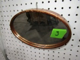 SMALL OVAL MIRROR APPROXIMATELY 10 X 7