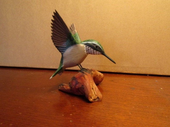 CARVED HUMMING BIRD ON STUMP SIGNED