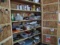 CONTENTS OF CABINET INCLUDING PAINTING SUPPLIES FASTENERS HAND TOOLS AND MO