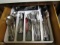 CONTENTS OF 4 DRAWERS INCLUDING COOKING UTENSILS FLATWARE AND MORE