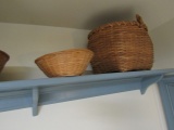 COLLECTIBLES ON SHELF INCLUDING BASKETS POTTERY AND MORE