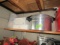 SHELF LOT WITH HOLIDAY DECORATIONS AND PRESSURE COOKER