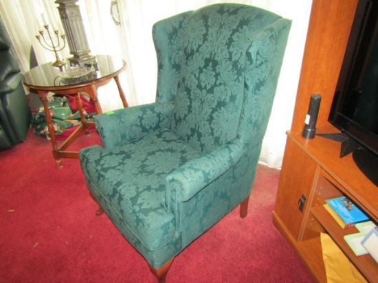 GREEN UPHOLSTERED WING BACK CHAIR