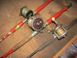 THREE FISHING RODS WITH CONVENTIONAL REELS