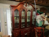 MAHOGANY CHINA HUTCH LIGHTED WITH MIRRORED BACK AND GLASS SHELVES BROKEN AR