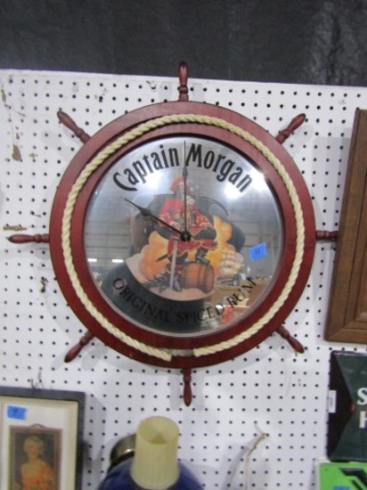 SCHAEFER BRASS WALL LIGHT AND CAPTAIN MORGAN CLOCK