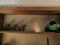 SHELF LOT INCLUDING IRON HORSES AND STUFFED ANIMALS