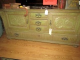 ANTIQUE OAK BOTTOM HALF OF SIDE BOARD WITH HEAVILY CARVED DOORS AND DRAWERS