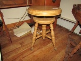ANTIQUE PIANO STOOL WITH BRASS FEET