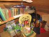 CONTENTS OF ATTIC INCLUDING HARDBACK BOOKS DECORATIONS GLASSWARE LUGGAGE GU