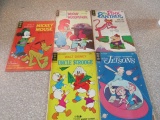 FIVE COMICS INCLUDING THE PINK PANTHER 104 WALT DISNEY MICKEY MOUSE AND PLU