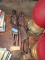 TWO HAND CARVED NATIVE STATUES OF WOMEN APPROX 23 INCH TALL AND 26 INCH TAL