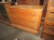 ANTIQUE OAK 3 DRAWER DRESSER WITH BRASS PULLS AND WOODEN KEY HOLES ON WOODE