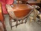 ANTIQUE GATE LEG DROP LEAF TABLE WITH HEAVILY CARVED TOP