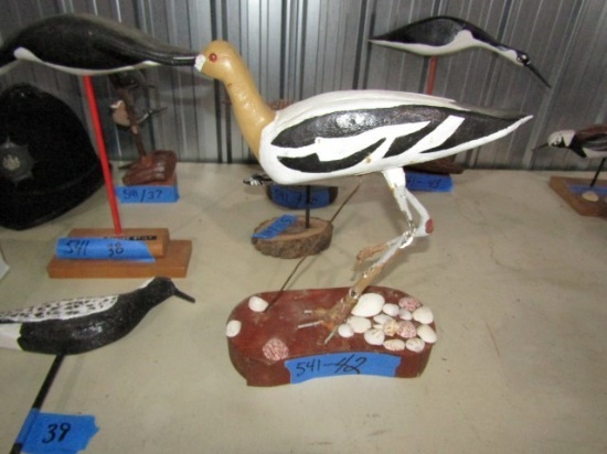 LARGE SHORE BIRD CARVING ON BASE WITH SEASHELLS