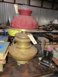 LARGE BRASS OIL LAMP WITH RED GLASS SHADE BASE MEASURES APPROX 12 INCH ACRO