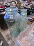 TWO LARGE GREEN GLASS VASES