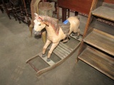 ANTIQUE ROCKING HORSE WITH LEATHER SADDLE AND HAIR TAIL