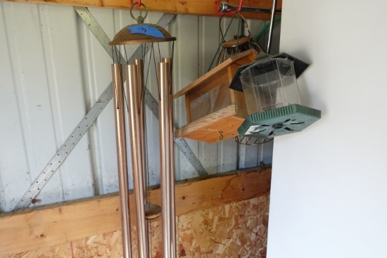WALL LOT INCLUDING LARGE WIND CHIMES AND BIRD FEEDERS AND ELECTRIC CORDS