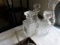 3 CUT GLASS DECANTERS AND ONE LARGE VASE APPROX 16 INCH TALL