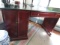 DESK APPROX 52 X 24 X 30 MAHOGANY WITH GLASS TOP
