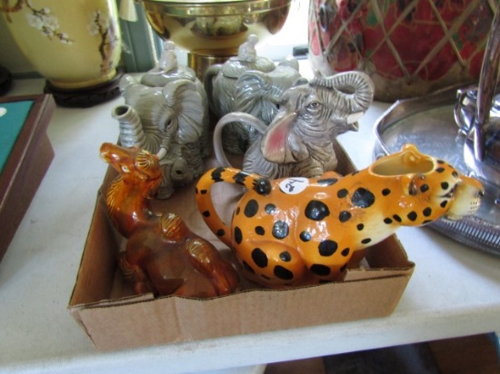 COLLECTION OF CREAMERS AND TEA POTS INCLUDING ELEPHANTS AND LEOPARDS AND CA