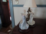 PAIR OF VICTORIAN LADY FIGURINES 9 INCH TALL ON TEAK BASES