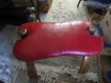 CAMEL SADDLE WITH RED CUSHION