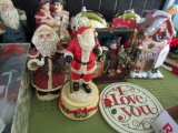 COLLECTION OF CHRISTMAS DECORATIVES INCLUDING SANTAS NUT CRACKERS AND MORE